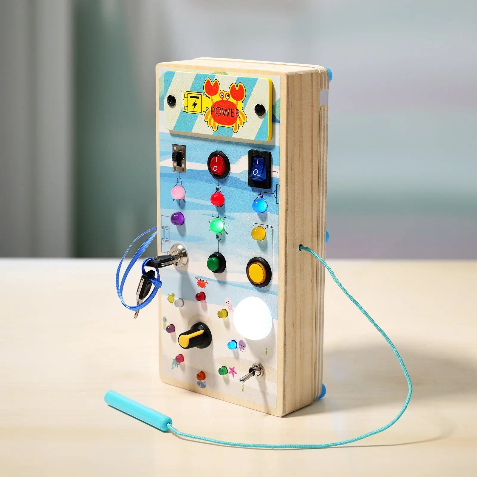 Drive & Learn™ – Wooden Steering Wheel Busy Board with Lights